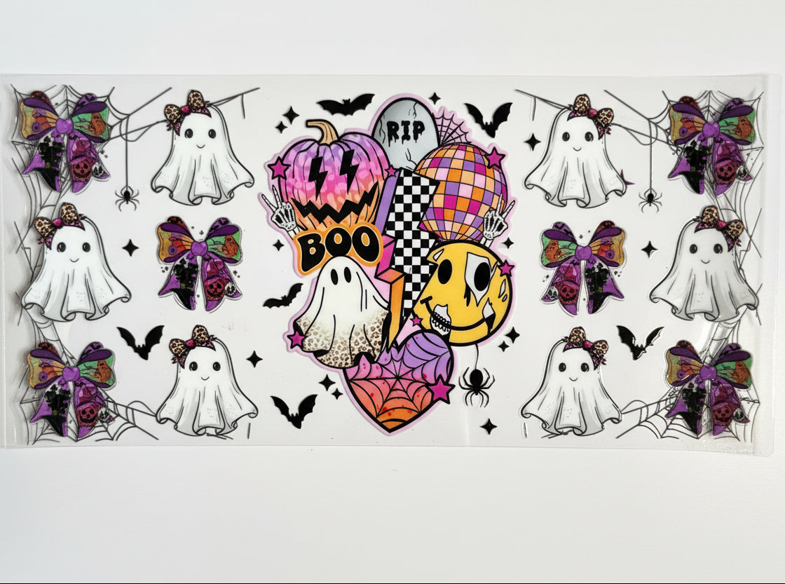 Halloween-themed featuring white ghosts, purple and black bows, bats, spiderwebs, and a central jack-o'-lantern and smiley face design