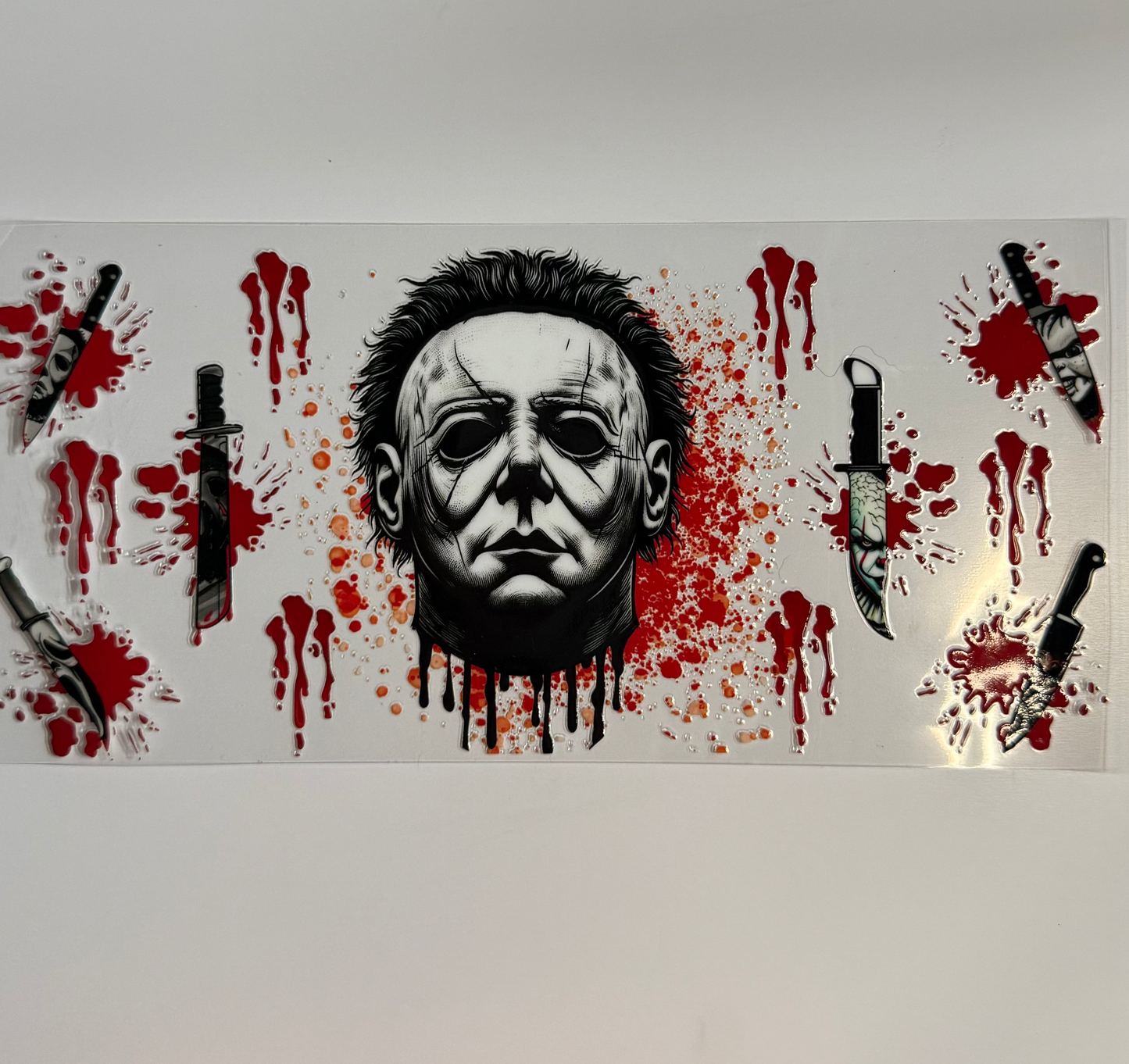 UVDTF featuring Michael Myers horror character face surrounded by red blood splatters and knives.