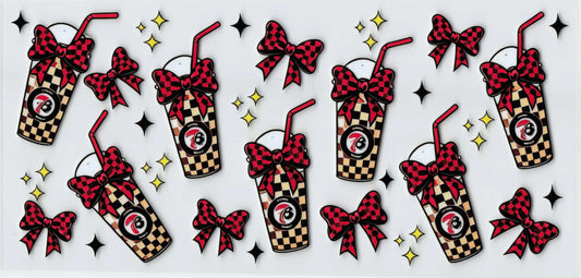 A repeating pattern of checkered drink cups with red-and-black checkered bows, red straws, and 7Brew logos, plus scattered red-and-black bows and yellow star accents 